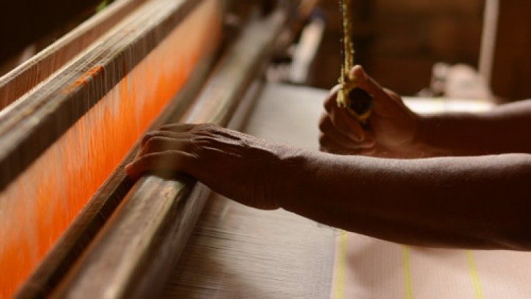 Artisan Working on Jacquard Loom