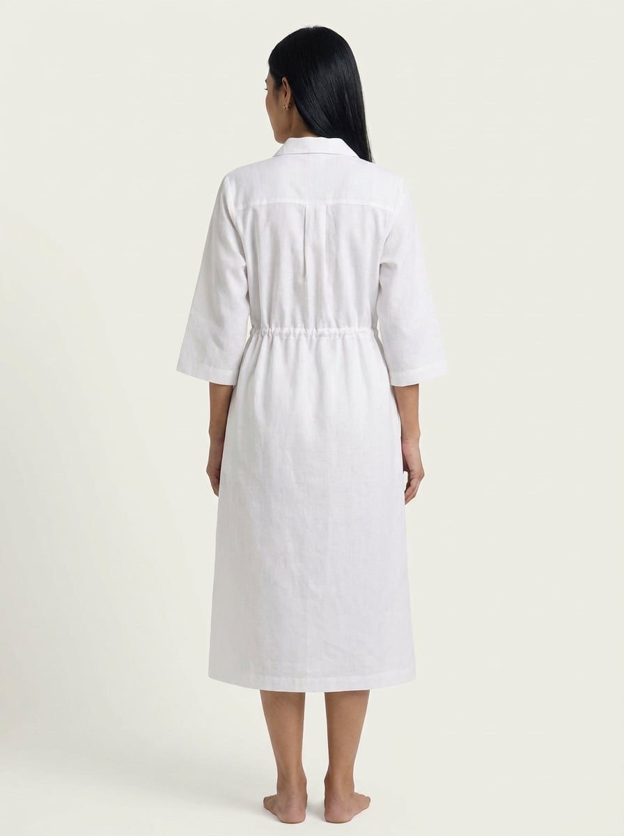 Back view of A-Line Shirt Midi Dress With Drawstring Waist in handwoven khadi cotton fabric.