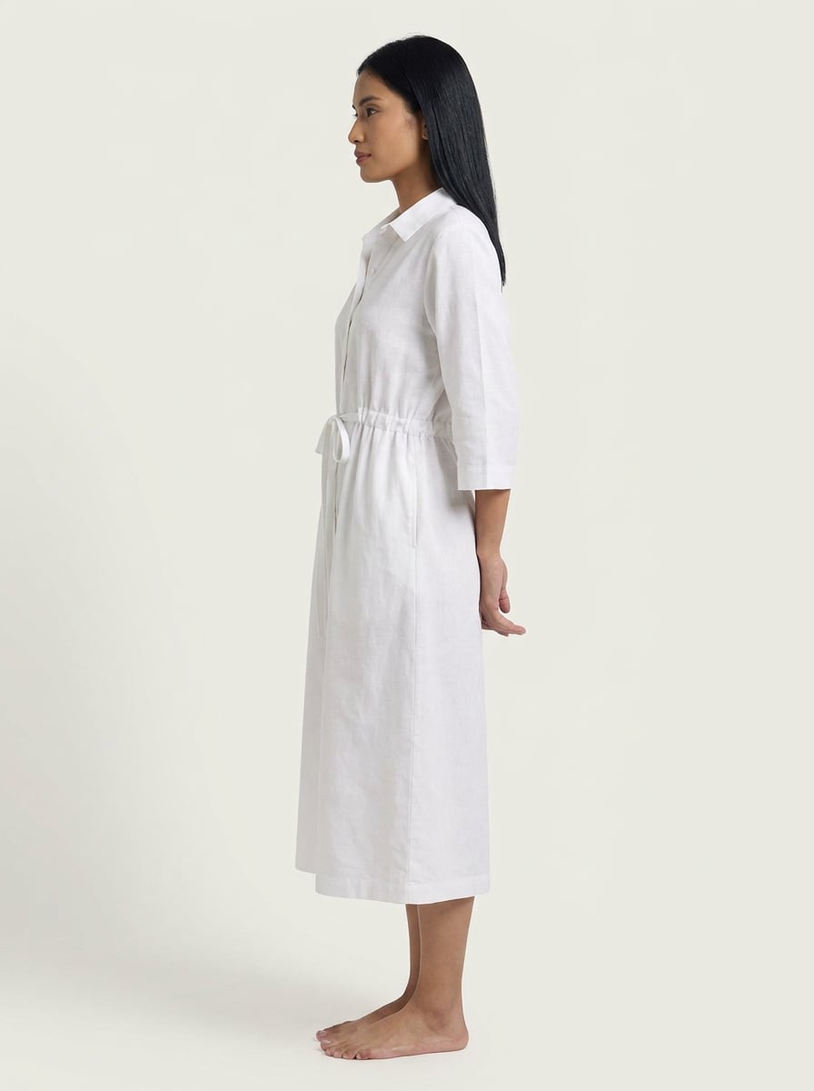 Side view of A-Line Shirt Midi Dress With Drawstring Waist in handwoven khadi cotton fabric.