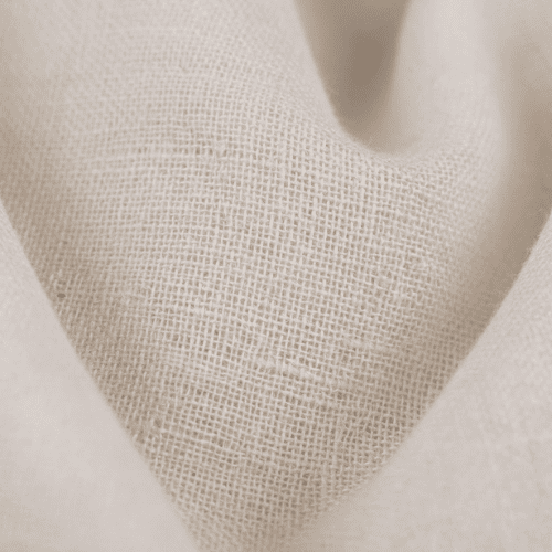 Fine plain weave and airy texture of muslin cotton fabric