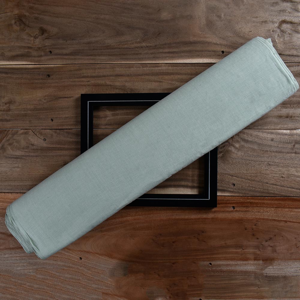 Chambray Light Green Khadi Cotton 62 GSM Handwoven Fabric