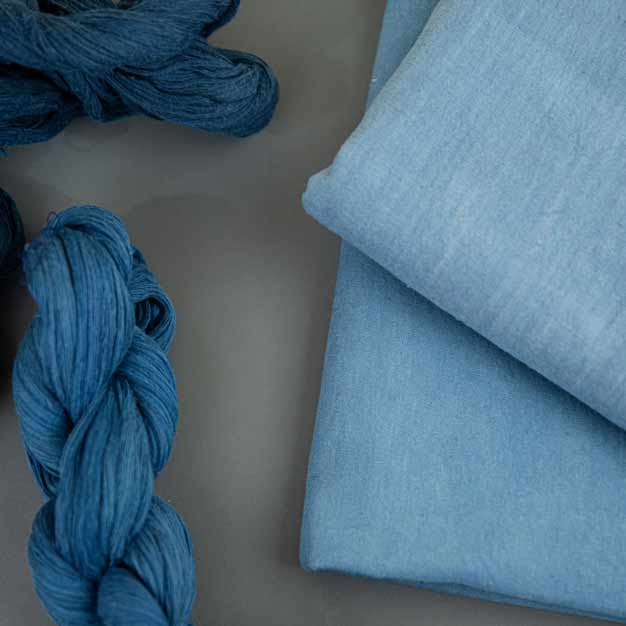 PLAIN BLUE NATURAL INDIGO DYED 115 GSM HANDWOVEN COTTON FABRIC