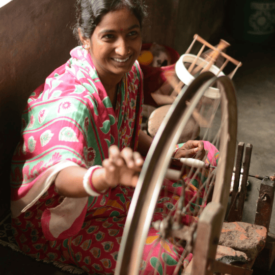 Women Spinning yarns on Charkha