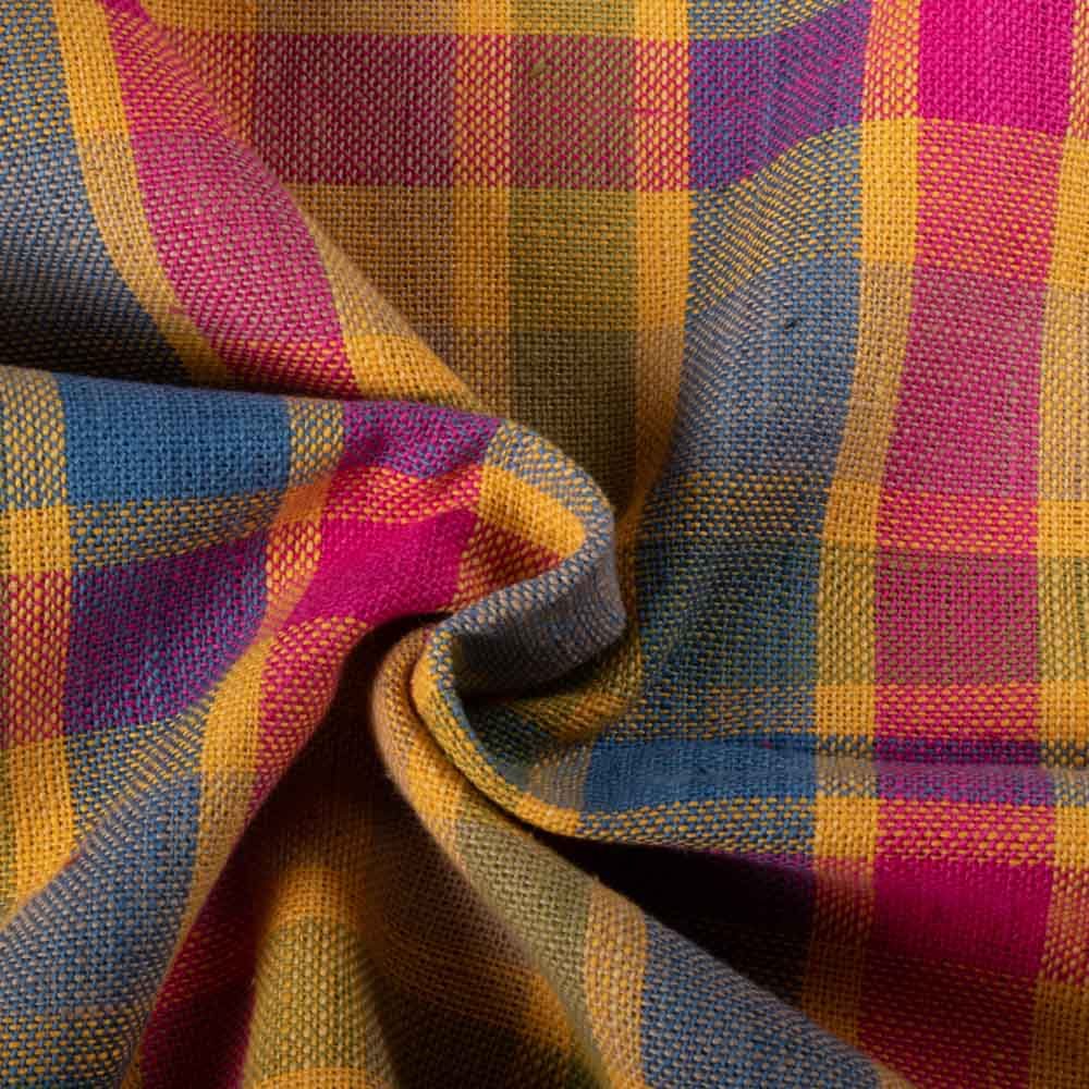 Twisted view of multicolor check khadi fabric showing its drape and flexibility