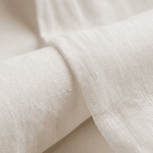 Mulmul cotton fabric showing the fine weave of muslin fabric