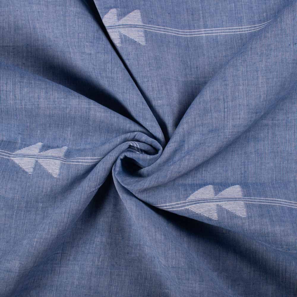 Twisted view of blue plain cotton Jamdani fabric with white arrow motif showing drape and flexibility